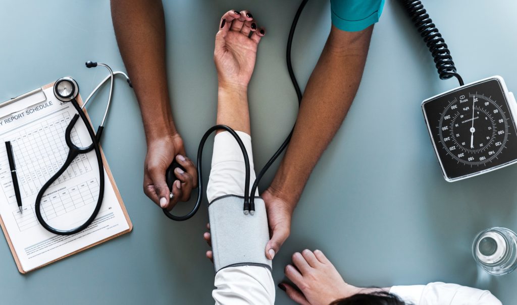 health provider taking care of a patient 