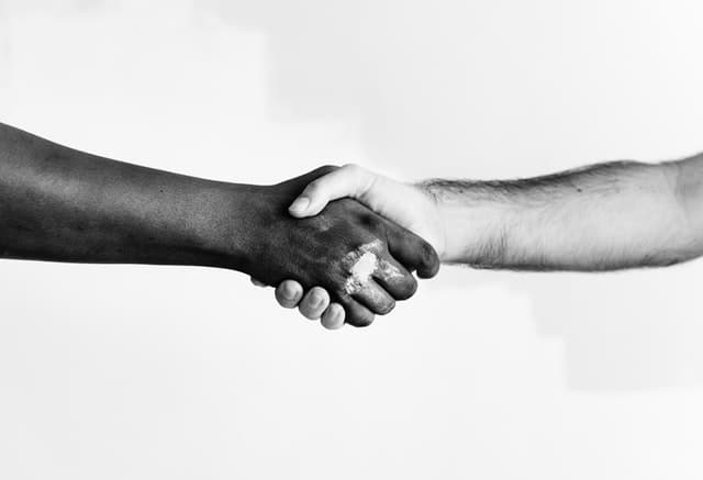 two people shaking hands