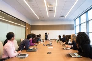 Group of people of all ages working together in an office 