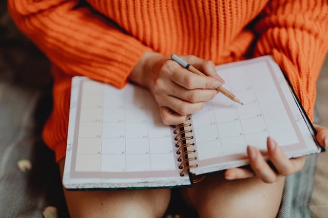 Woman looking at her schedule