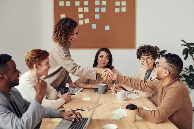 group-of-people-sitting-indoors